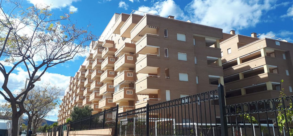 apartment building descale main water pipes hard water softener