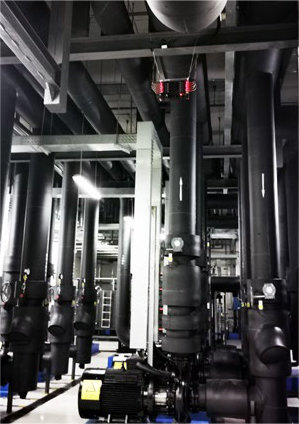 Cooling tower and piping at Zhaolin Plaza