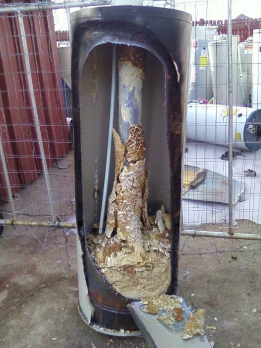 hot water tank issue hard water scale damage